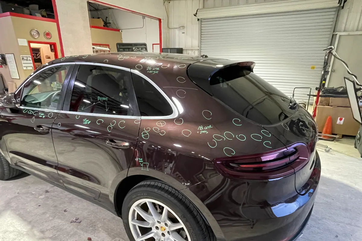 Porsche Macan with individually documented dents