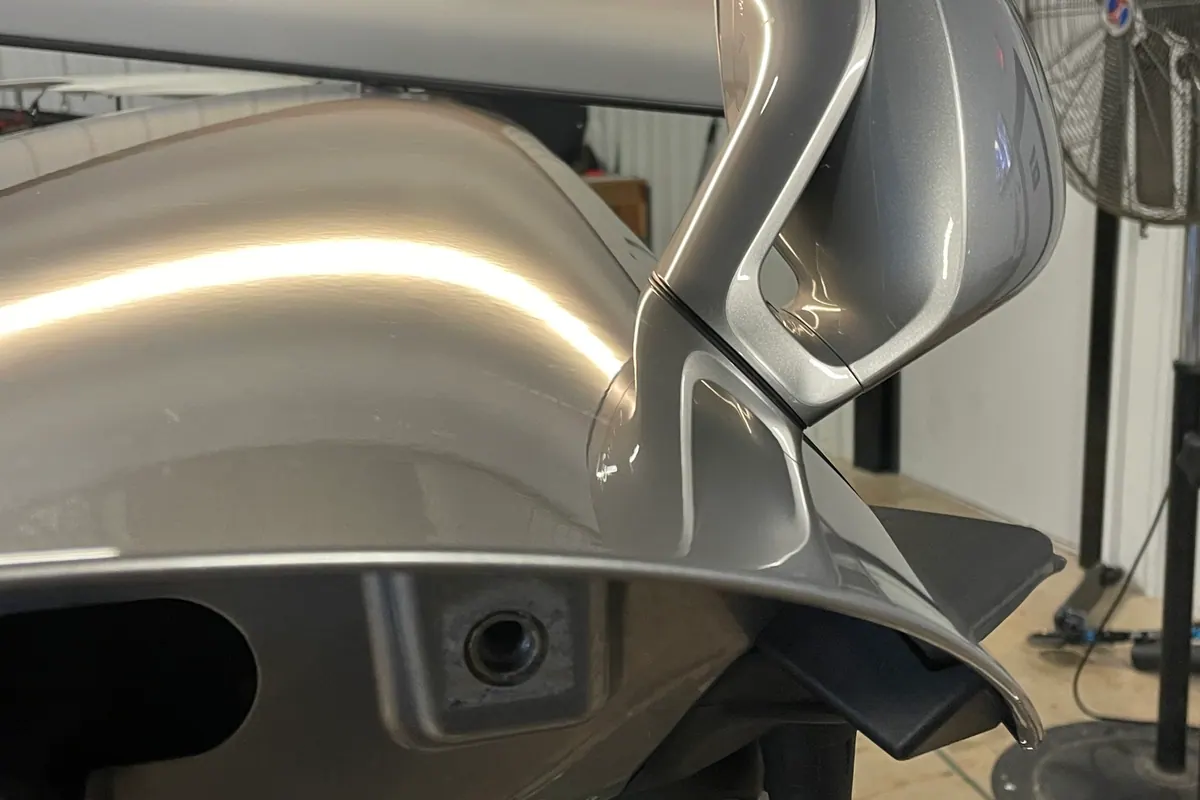 Porsche body panel checked for edge-line accuracy